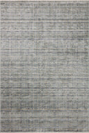 The Soho SOH-04 Jade / Stone Area Rug delivers refreshing jade and grounding stone beauty and contemporary and abstract elegance in a power-loomed 100% polyester area rug