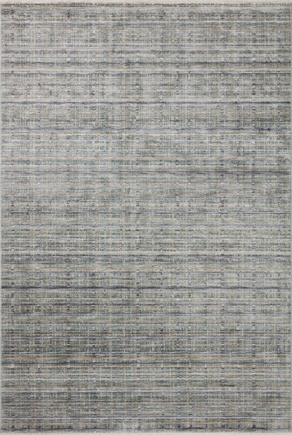The Soho SOH-04 Jade / Stone Area Rug delivers refreshing jade and grounding stone beauty and contemporary and abstract elegance in a power-loomed 100% polyester area rug