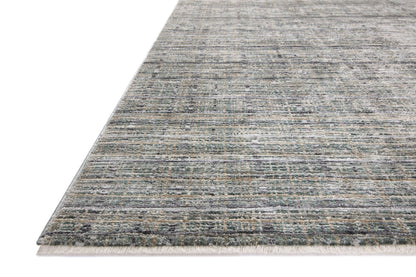 The Soho SOH-04 Jade / Stone Area Rug delivers refreshing jade and grounding stone beauty and contemporary and abstract elegance in a power-loomed 100% polyester area rug