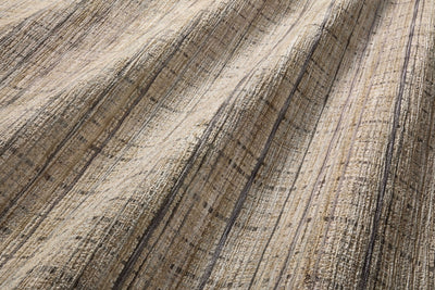 Designed with contemporary and abstract artistry in subtle pebble and deep charcoal hues, the Soho SOH-04 Pebble / Charcoal Area Rug is a power-loomed 100% polyester area rug that stands out