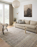 Designed with contemporary and abstract artistry in subtle pebble and deep charcoal hues, the Soho SOH-04 Pebble / Charcoal Area Rug is a power-loomed 100% polyester area rug that stands out