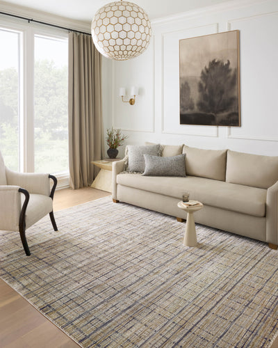Designed with contemporary and abstract artistry in subtle pebble and deep charcoal hues, the Soho SOH-04 Pebble / Charcoal Area Rug is a power-loomed 100% polyester area rug that stands out
