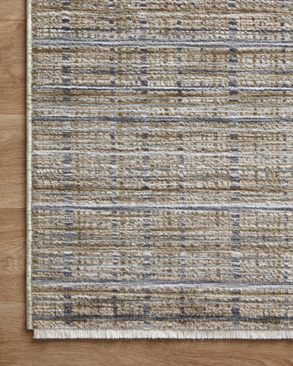 Designed with contemporary and abstract artistry in subtle pebble and deep charcoal hues, the Soho SOH-04 Pebble / Charcoal Area Rug is a power-loomed 100% polyester area rug that stands out