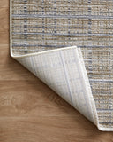 Designed with contemporary and abstract artistry in subtle pebble and deep charcoal hues, the Soho SOH-04 Pebble / Charcoal Area Rug is a power-loomed 100% polyester area rug that stands out