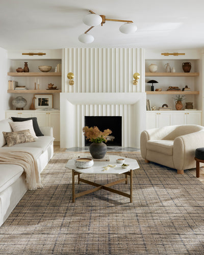 Designed with contemporary and abstract artistry in subtle pebble and deep charcoal hues, the Soho SOH-04 Pebble / Charcoal Area Rug is a power-loomed 100% polyester area rug that stands out