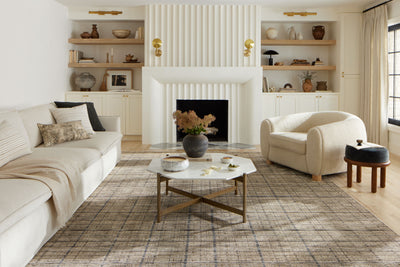 Designed with contemporary and abstract artistry in subtle pebble and deep charcoal hues, the Soho SOH-04 Pebble / Charcoal Area Rug is a power-loomed 100% polyester area rug that stands out
