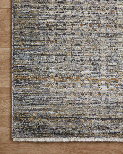 The Soho SOH-05 Charcoal / Multi Area Rug combines deep charcoal and vibrant multi-toned tones and contemporary and abstract patterns in a power-loomed 100% polyester area rug for effortless elegance