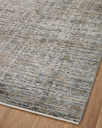 The Soho SOH-05 Charcoal / Multi Area Rug combines deep charcoal and vibrant multi-toned tones and contemporary and abstract patterns in a power-loomed 100% polyester area rug for effortless elegance