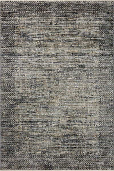 A power-loomed 100% polyester area rug featuring contemporary and abstract design and vibrant multi-toned and cool slate tones, the Soho SOH-06 Multi / Slate Area Rug adds character to any room