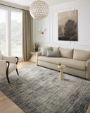 A power-loomed 100% polyester area rug featuring contemporary and abstract design and vibrant multi-toned and cool slate tones, the Soho SOH-06 Multi / Slate Area Rug adds character to any room