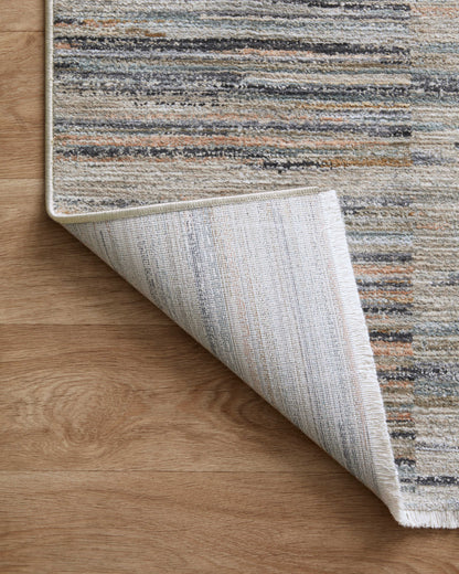Rich in vibrant multi-toned and gentle dove hues with contemporary and abstract detail, the Soho SOH-07 Multi / Dove Area Rug is a power-loomed 100% polyester area rug built for style and comfort