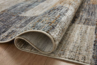 The Soho SOH-08 Grey / Gold Area Rug offers elegant grey and radiant gold sophistication and contemporary and abstract charm in a power-loomed 100% polyester area rug
