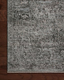 The Sonnet SNN-07 Charcoal / Mist Area Rug is a power-loomed polypropylene and polyester area rug that radiates deep charcoal and soft misty charm and traditional elegance