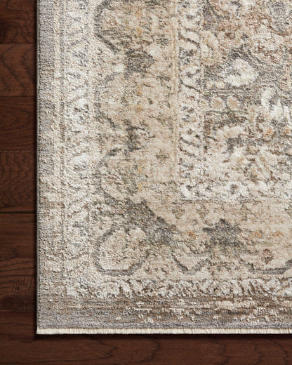 Layered in elegant grey and calming sage hues with traditional patterns, the Sonnet SNN-08 Grey / Sage Area Rug is a power-loomed polypropylene and polyester area rug perfect for any setting