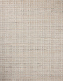 Expertly crafted as a hand-loomed wool area rug with graphic artistry, the Sonya SOY-01 Ivory / Natural Area Rug captures refined ivory and warm natural tones beautifully