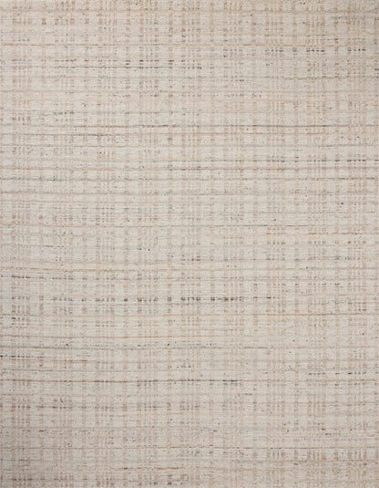 Expertly crafted as a hand-loomed wool area rug with graphic artistry, the Sonya SOY-01 Ivory / Natural Area Rug captures refined ivory and warm natural tones beautifully
