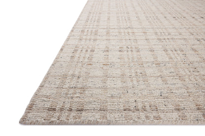 Expertly crafted as a hand-loomed wool area rug with graphic artistry, the Sonya SOY-01 Ivory / Natural Area Rug captures refined ivory and warm natural tones beautifully