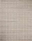 A hand-loomed wool area rug with graphic design in soft misty and cozy oatmeal hues, the Sonya SOY-03 Mist / Oatmeal Area Rug is a standout in any décor
