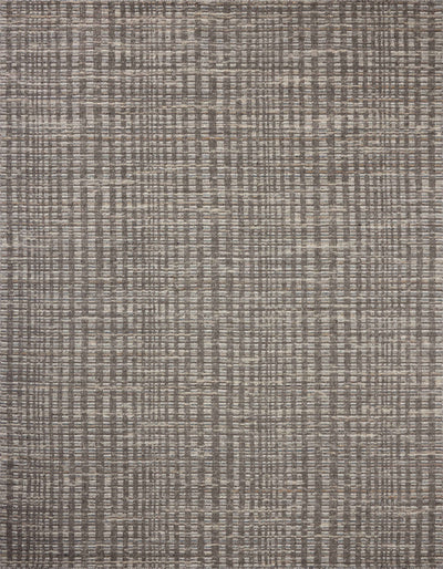 Dressed in striking granite and vibrant multi-toned hues with graphic detail, the Sonya SOY-05 Granite / Multi Area Rug is a hand-loomed wool area rug that completes any room