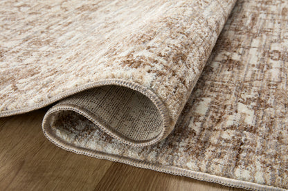A power-loomed 100% polyester area rug with vintage flair in grounded bark and warm natural tones, the Sorrento SOR-01 Bark / Natural Area Rug anchors any room