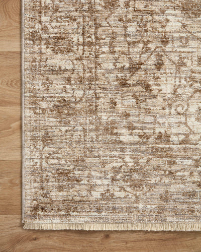 A power-loomed 100% polyester area rug with vintage flair in grounded bark and warm natural tones, the Sorrento SOR-01 Bark / Natural Area Rug anchors any room