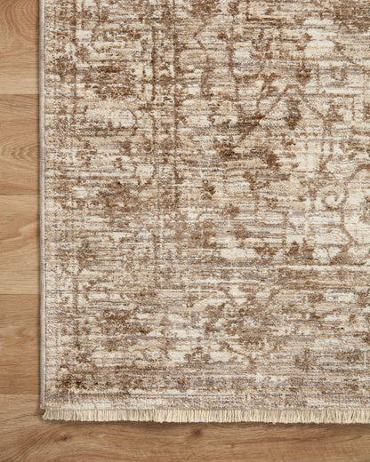 A power-loomed 100% polyester area rug with vintage flair in grounded bark and warm natural tones, the Sorrento SOR-01 Bark / Natural Area Rug anchors any room
