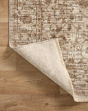 A power-loomed 100% polyester area rug with vintage flair in grounded bark and warm natural tones, the Sorrento SOR-01 Bark / Natural Area Rug anchors any room