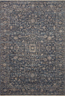 The Sorrento SOR-01 Midnight / Natural Area Rug pairs dramatic midnight and warm natural tones and vintage patterns in a power-loomed 100% polyester area rug
