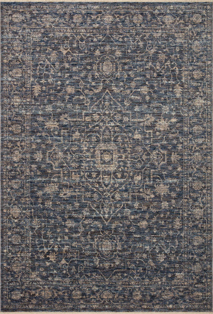 The Sorrento SOR-01 Midnight / Natural Area Rug pairs dramatic midnight and warm natural tones and vintage patterns in a power-loomed 100% polyester area rug