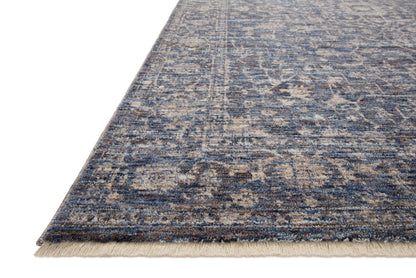 The Sorrento SOR-01 Midnight / Natural Area Rug pairs dramatic midnight and warm natural tones and vintage patterns in a power-loomed 100% polyester area rug