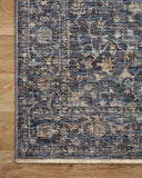 The Sorrento SOR-01 Midnight / Natural Area Rug pairs dramatic midnight and warm natural tones and vintage patterns in a power-loomed 100% polyester area rug