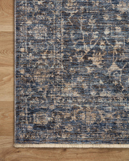 The Sorrento SOR-01 Midnight / Natural Area Rug pairs dramatic midnight and warm natural tones and vintage patterns in a power-loomed 100% polyester area rug