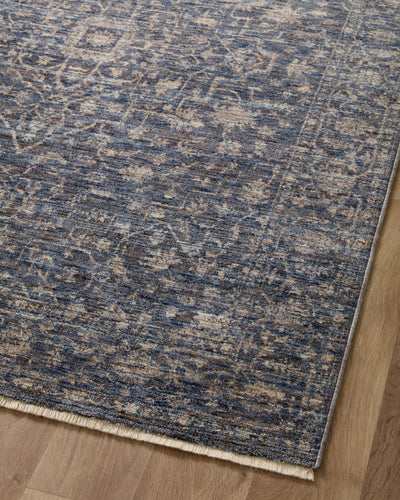The Sorrento SOR-01 Midnight / Natural Area Rug pairs dramatic midnight and warm natural tones and vintage patterns in a power-loomed 100% polyester area rug