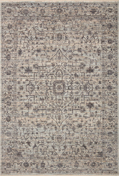 Crafted as a power-loomed 100% polyester area rug, the Sorrento SOR-01 Mist / Charcoal Area Rug brings soft misty and deep charcoal warmth and vintage character to your space