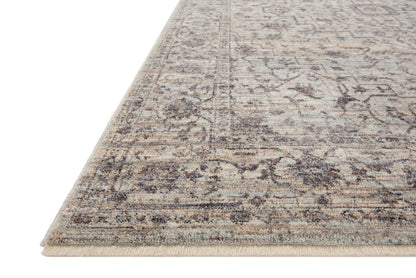 Crafted as a power-loomed 100% polyester area rug, the Sorrento SOR-01 Mist / Charcoal Area Rug brings soft misty and deep charcoal warmth and vintage character to your space