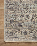 Crafted as a power-loomed 100% polyester area rug, the Sorrento SOR-01 Mist / Charcoal Area Rug brings soft misty and deep charcoal warmth and vintage character to your space