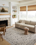 Crafted as a power-loomed 100% polyester area rug, the Sorrento SOR-01 Mist / Charcoal Area Rug brings soft misty and deep charcoal warmth and vintage character to your space