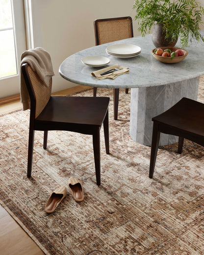 The Sorrento SOR-03 Mocha / Multi Area Rug blends luxurious mocha and vibrant multi-toned tones and vintage motifs into a power-loomed 100% polyester area rug with timeless appeal