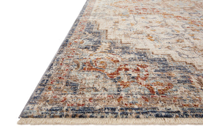 The Sorrento SOR-05 Ivory / Fiesta Area Rug delivers refined ivory and lively fiesta beauty and vintage elegance in a power-loomed 100% polyester area rug
