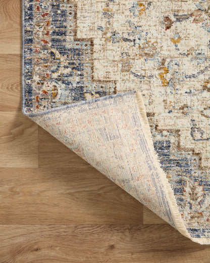 The Sorrento SOR-05 Ivory / Fiesta Area Rug delivers refined ivory and lively fiesta beauty and vintage elegance in a power-loomed 100% polyester area rug