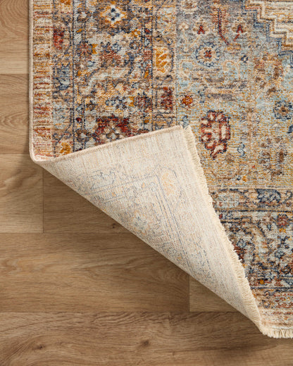 Designed with vintage artistry in vibrant multi-toned and glowing sunset hues, the Sorrento SOR-06 Multi / Sunset Area Rug is a power-loomed 100% polyester area rug that stands out