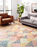 The Spectrum SPE-01 Ivory / Multi Area Rug combines refined ivory and vibrant multi-toned tones and geometric and eclectic patterns in a hooked wool area rug for effortless elegance