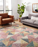 Rich in shimmering silver and lively fiesta hues with geometric and eclectic detail, the Spectrum SPE-01 Silver / Fiesta Area Rug is a hooked wool area rug built for style and comfort