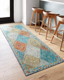 The Spectrum SPE-02 Sunset / Ocean Area Rug offers glowing sunset and serene ocean sophistication and geometric and eclectic charm in a hooked wool area rug