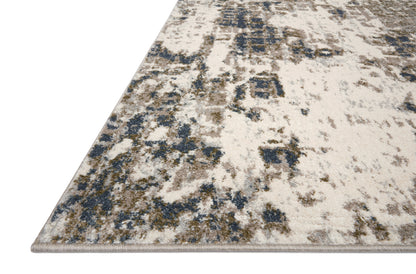Finished in distinctive pewter and earthy olive tones with abstract styling, the Spirit SPI-01 Pewter / Olive Area Rug is a power-loomed 100% polypropylene area rug for modern living