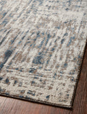A power-loomed 100% polypropylene area rug with abstract design in grounding stone and calming blue hues, the Spirit SPI-02 Stone / Blue Area Rug is a standout in any décor