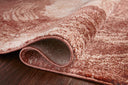 The Spirit SPI-03 Rose / Spice Area Rug highlights romantic rose and spirited spice tones and abstract texture in a beautifully made power-loomed 100% polypropylene area rug