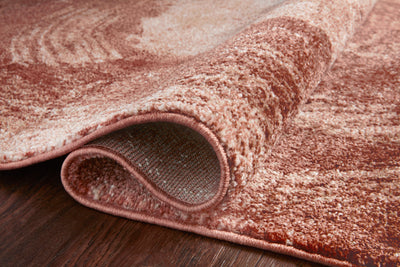 The Spirit SPI-03 Rose / Spice Area Rug highlights romantic rose and spirited spice tones and abstract texture in a beautifully made power-loomed 100% polypropylene area rug