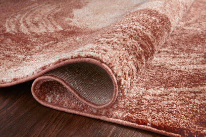 The Spirit SPI-03 Rose / Spice Area Rug highlights romantic rose and spirited spice tones and abstract texture in a beautifully made power-loomed 100% polypropylene area rug