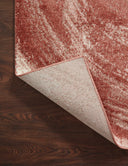 The Spirit SPI-03 Rose / Spice Area Rug highlights romantic rose and spirited spice tones and abstract texture in a beautifully made power-loomed 100% polypropylene area rug